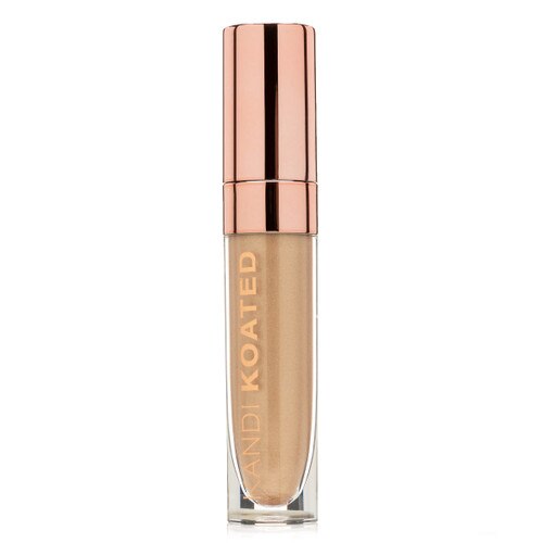 A closed clear and rose gold tube of Luster in “Cool Whip”, a pale gold with a metallic finish. The tube has Kandi Koated written up the side and a rose gold cap.